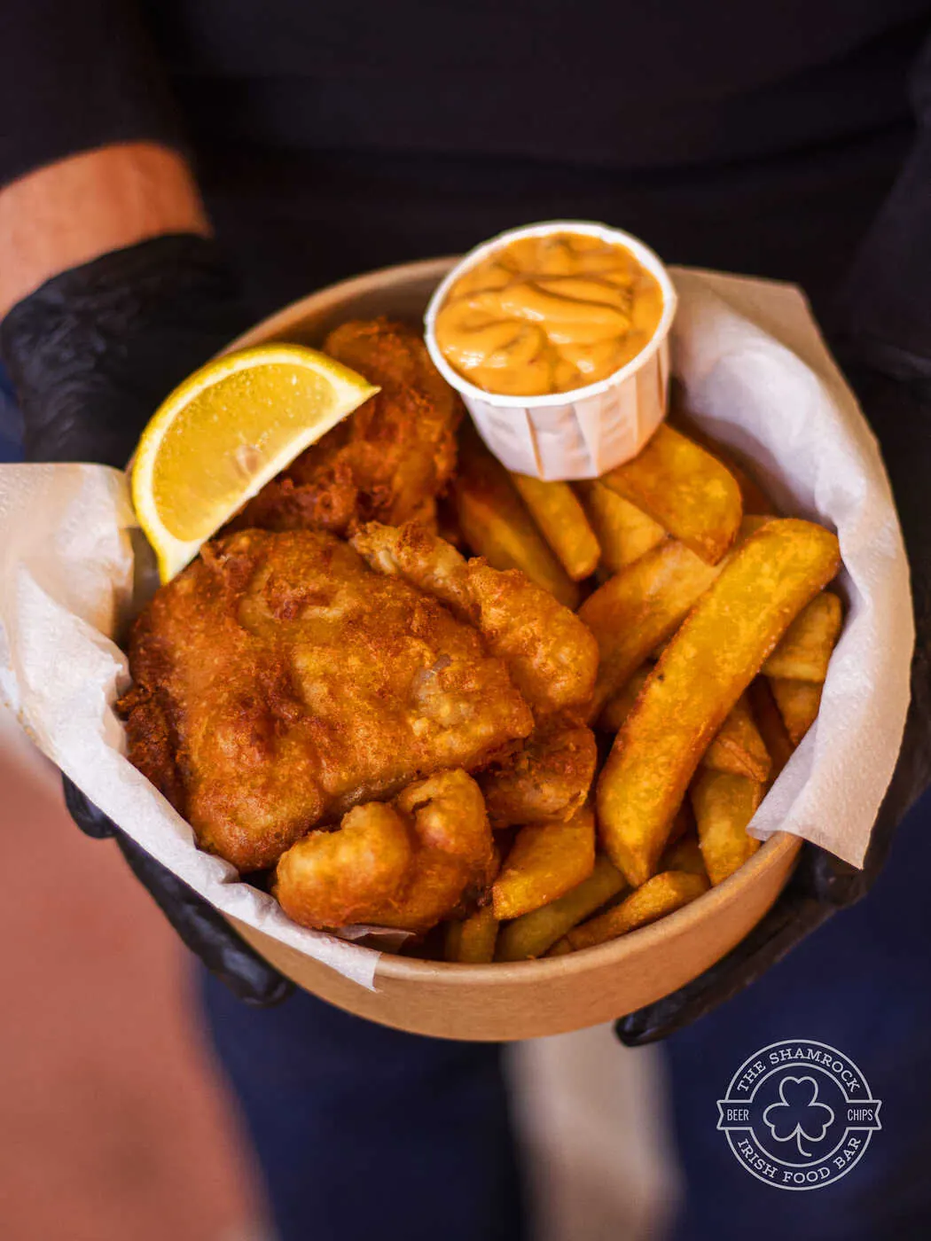 Fish and chips basket with a pint at the Classic